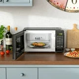 Mainstays 0.7 Cu ft Countertop Microwave Oven, 700 Watts , Black, Child Safety Lock